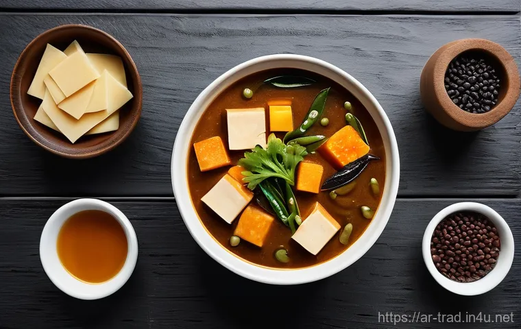 된장의 역사 - **The Heartwarming Comfort of Doenjang Jjigae:** A vibrant, inviting overhead shot of a steaming...
