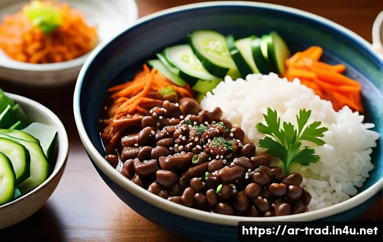 청국장의 효능 - A vibrant and detailed close-up of a traditional Korean meal featuring a bowl of steaming cheonggukj...